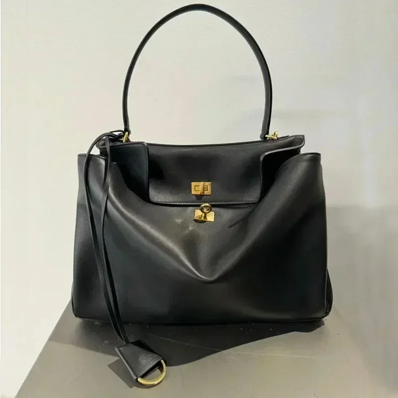 Luxury Gold Lock Designer Hand - Leatherwork Designs recension och pris